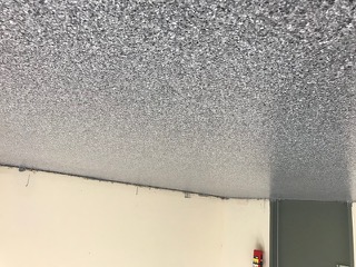 Gray flake epoxy in organized garage